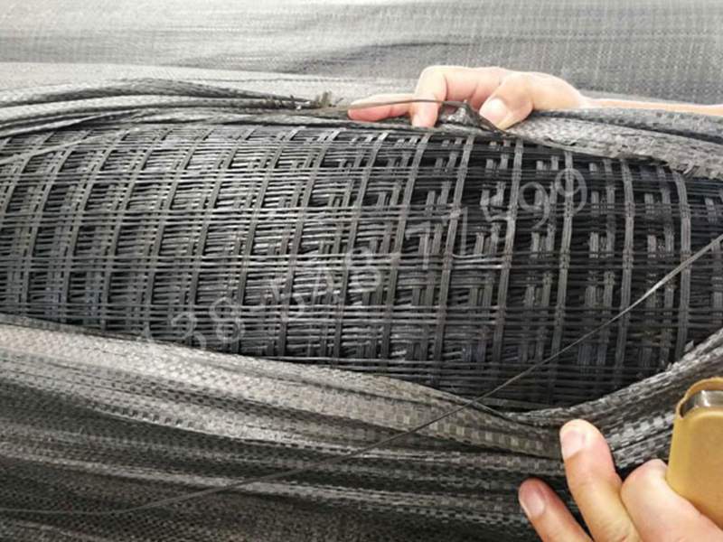 玻纤复合土工格栅:特性、应用及施工解析 玻纤复合土工格栅:特性、应用及施工解析